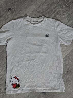 adidas Women’s White Short Sleeve Tee with Hello Kitty Patch